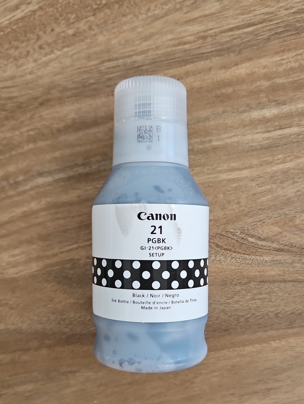 Canon Black Ink Bottle with White Label